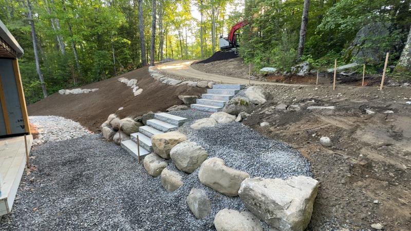 Granite retaining wall by Envy Excavation