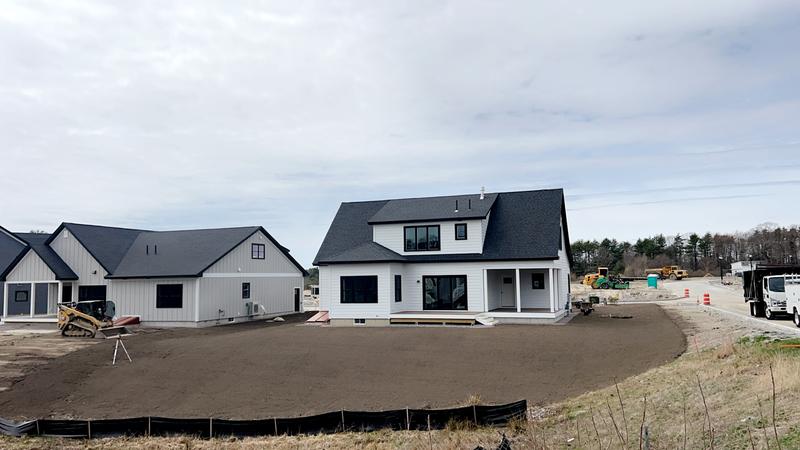 Topsoil placement and rough grading by Envy