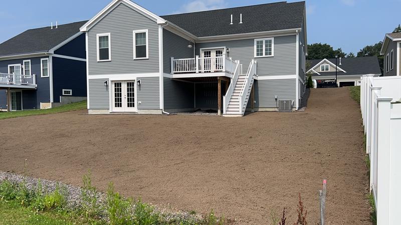 Topsoil placement and rough grading by Envy