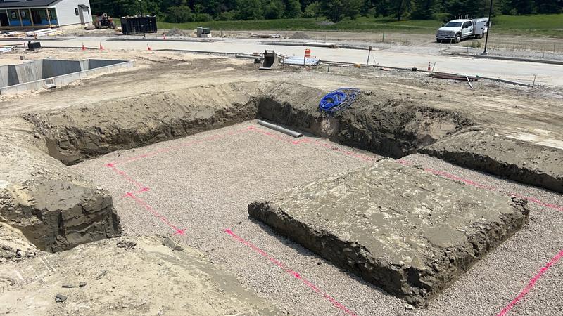Backfill and compaction around a new foundation