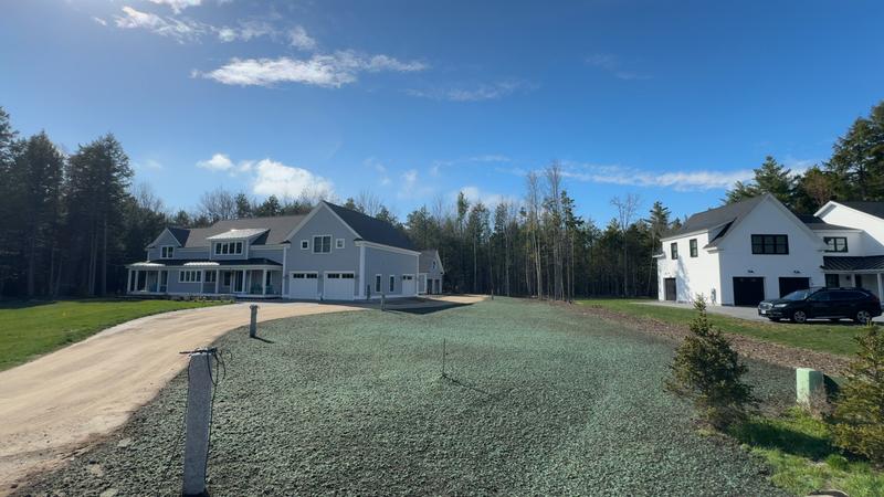 Topsoil placement and rough grading by Envy