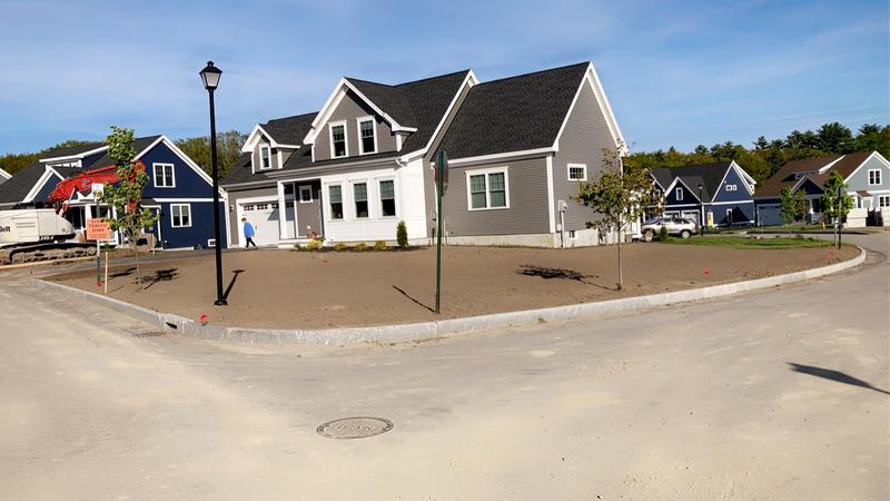 Topsoil placement and rough grading by Envy