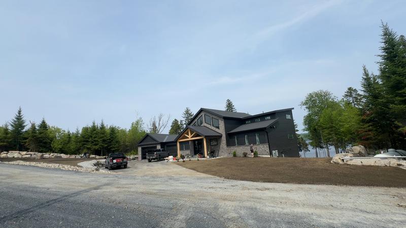 Topsoil placement and rough grading by Envy