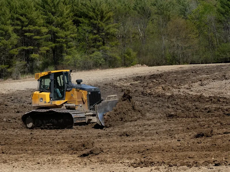 Bulldozer grading a cleared site