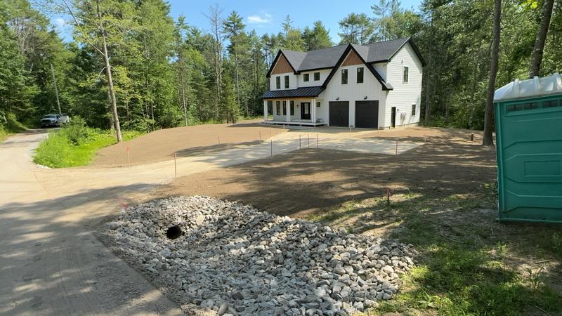 Topsoil placement and rough grading by Envy