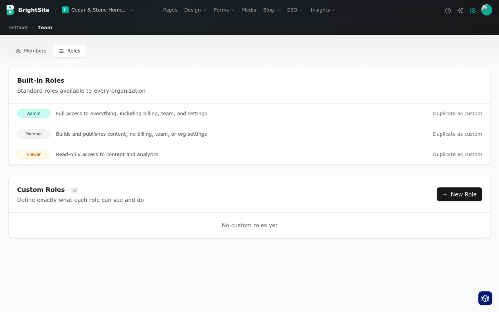 The custom roles screen, listing roles alongside the permissions each one grants.
