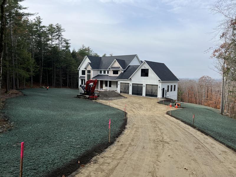 Topsoil placement and rough grading by Envy