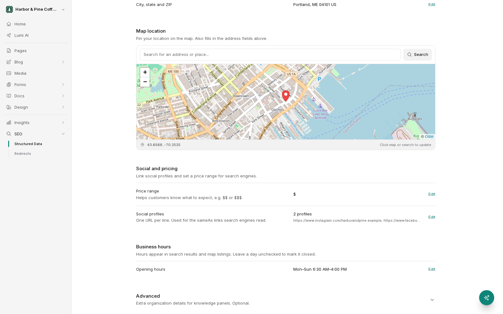The lower half of the Structured data screen. Map location has an address search box and a map with a red pin on the business, with its coordinates shown underneath. Social and pricing shows the price range and two linked social profiles. Business hours shows the opening hours, and a collapsed Advanced section sits at the bottom.