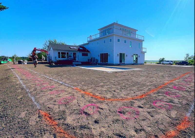 Topsoil placement and rough grading by Envy