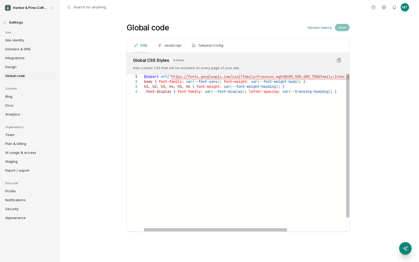 The Global code settings screen with CSS, JavaScript and Tailwind Config tabs. The CSS tab is open, showing a Global CSS Styles code editor with four lines that load fonts and set heading and body styles. Version history and Save sit at the top right.
