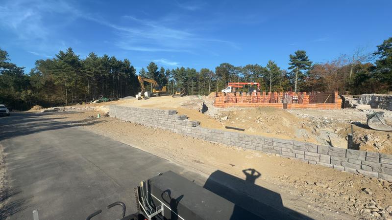 Granite retaining wall by Envy Excavation