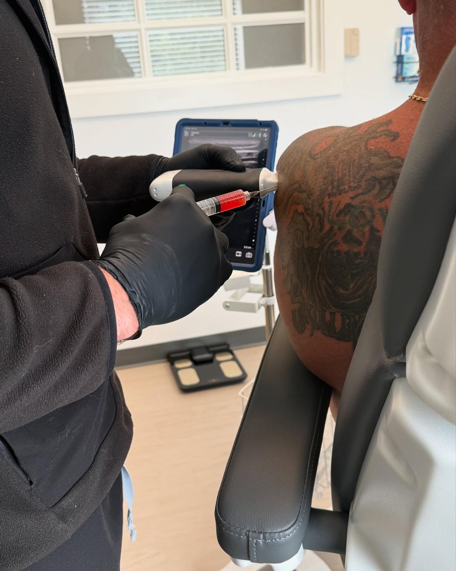 Provider performing ultrasound-guided PRP injection at TruForm Longevity in Falmouth, Maine